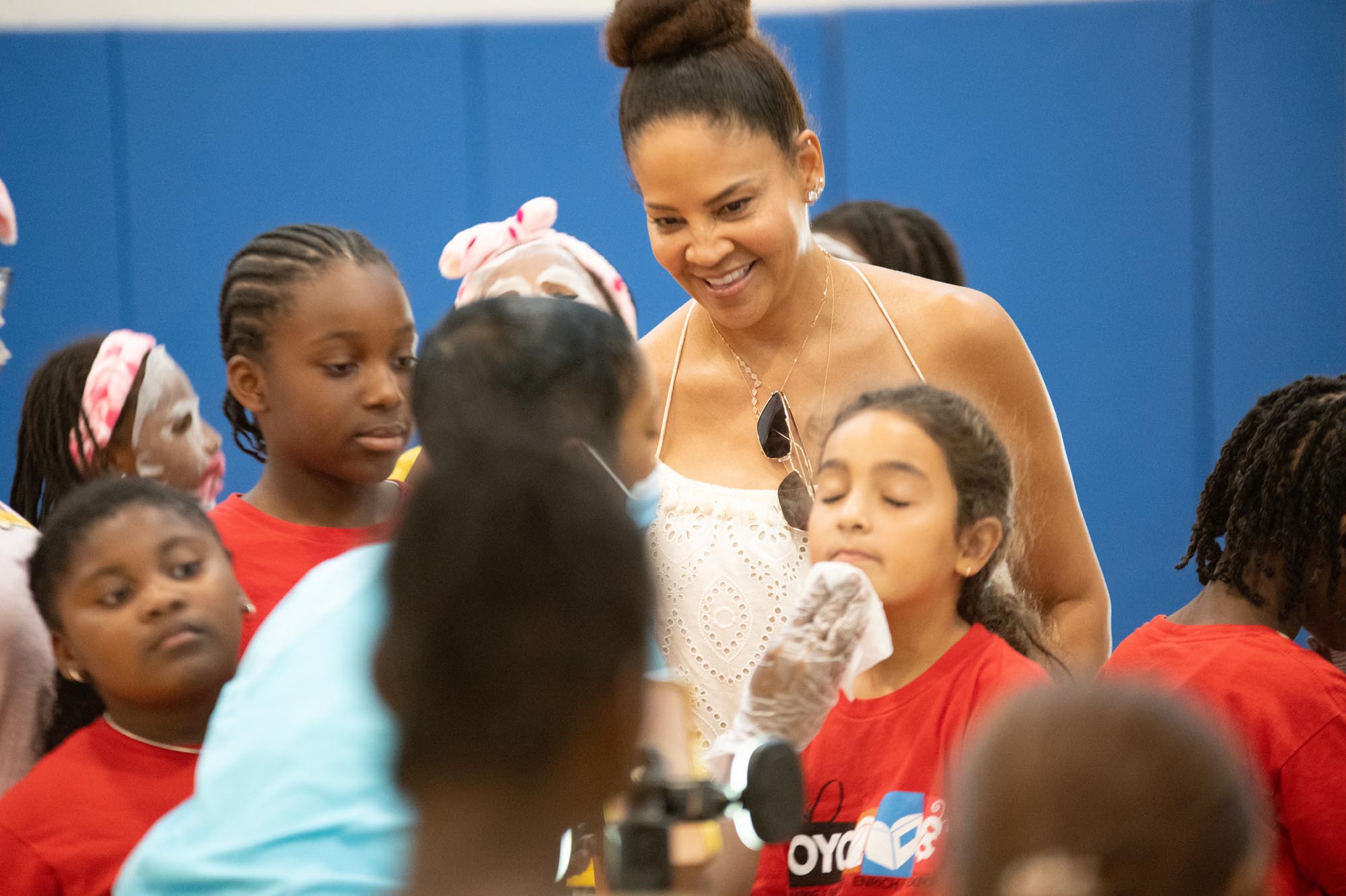 Tracy Wilson Mourning surrounded by a group of young girls