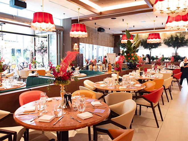 tables with settings inside the Serafina restaurant
